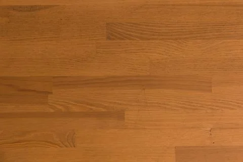 Wooden surface as background texture with rays of light. Stock-Fotos