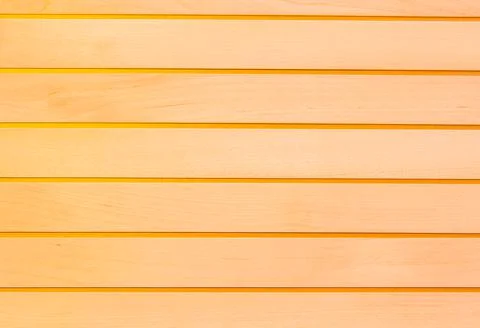 Wooden surface as background texture with rays of light. Stock-Fotos