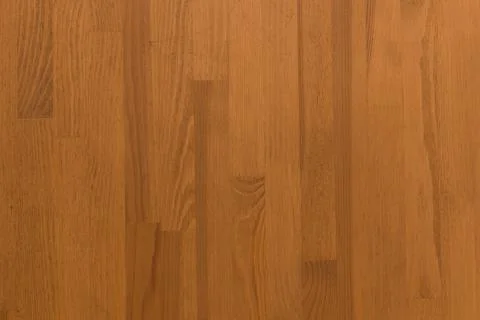 Wooden surface as background texture with rays of light. 写真素材