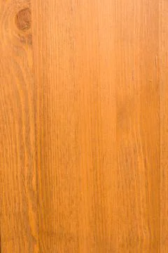 Wooden surface as background texture with rays of light. Stock Photos