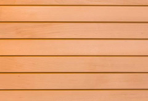 Wooden surface as background texture with rays of light. Stock Photos