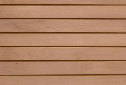 Wooden surface as background texture with rays of light. Stock Photos