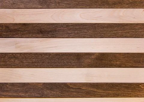 Wooden surface as background texture with rays of light Stock Photos