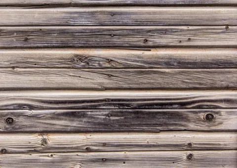 Wooden surface as background texture with rays of light. Stock Photos