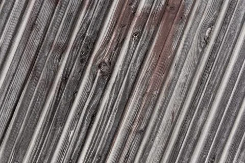 Wooden surface as background texture with rays of light. Stock Photos