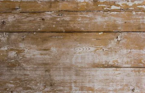 Wooden surface as background texture with rays of light. Stock Photos