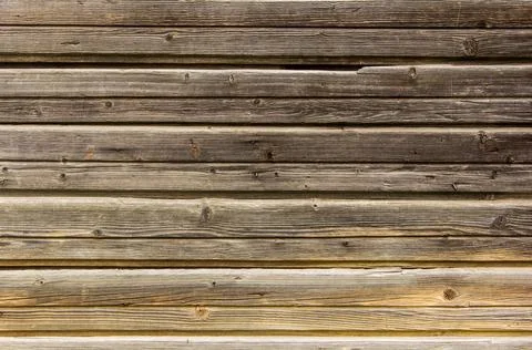 Wooden surface as background texture with rays of light. Stock Photos