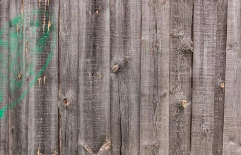 Wooden surface as background texture with rays of light. Stock Photos