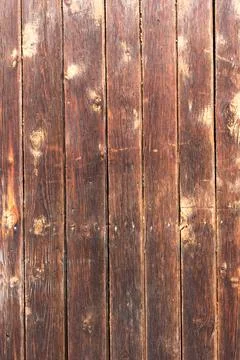 Wooden surface as background texture with rays of light. Stock Photos