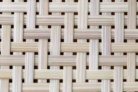 Wooden surface of pattern wicker bamboo in handmade. Stock Photos