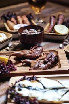 Wooden Table Displaying an Array of Delicious Food Stock Photos