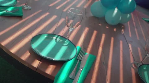 Wooden table with empty, clean dishes and wine glasses Stock Footage 147684734