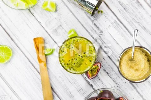 Wooden table with Jorge Amado Cocktail (detailed close-up shot; selective foc Stock Photos