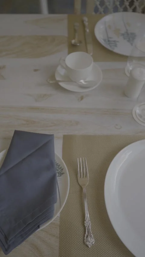 A wooden table set with an array of crockery. Stock Footage 313031853