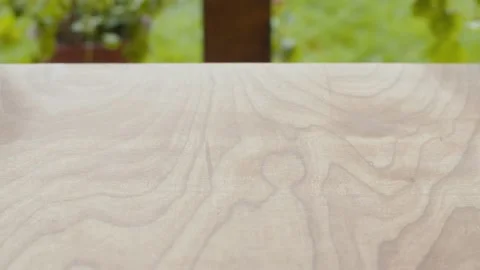 Wooden table surface in the garden Stock Footage 137629555