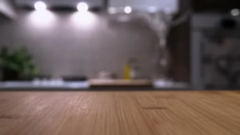 Wooden table top on blur kitchen room background. Video stock 162784932