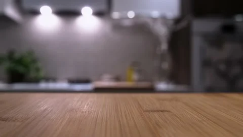 Wooden table top on blur kitchen room background. Stock Footage 162787677