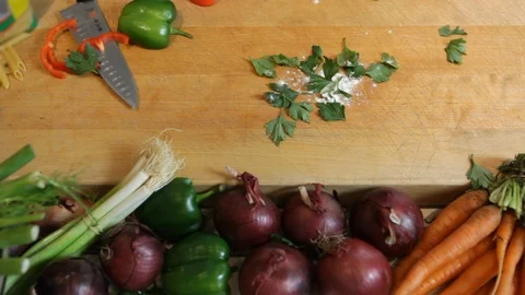 Wooden table top with vegetables. Preparing food in the kitchen. 스톡 동영상 106078262