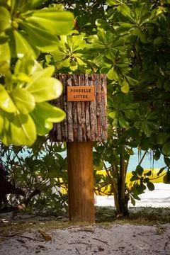 Wooden trash can to throw objects found on the beach in Ecology protection of Stock Photos