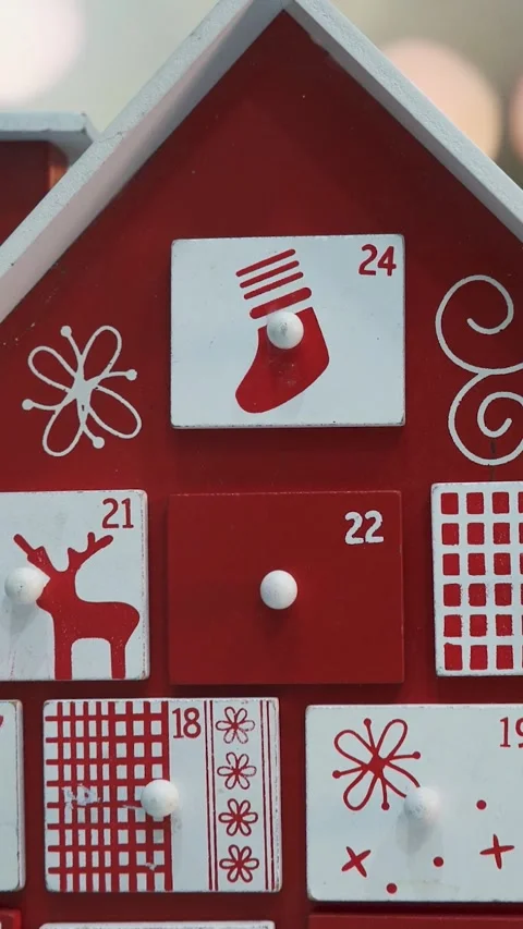 Wooden Tree Advent Calendar in Front of a Real Christmas Tree Stock Footage 321711493