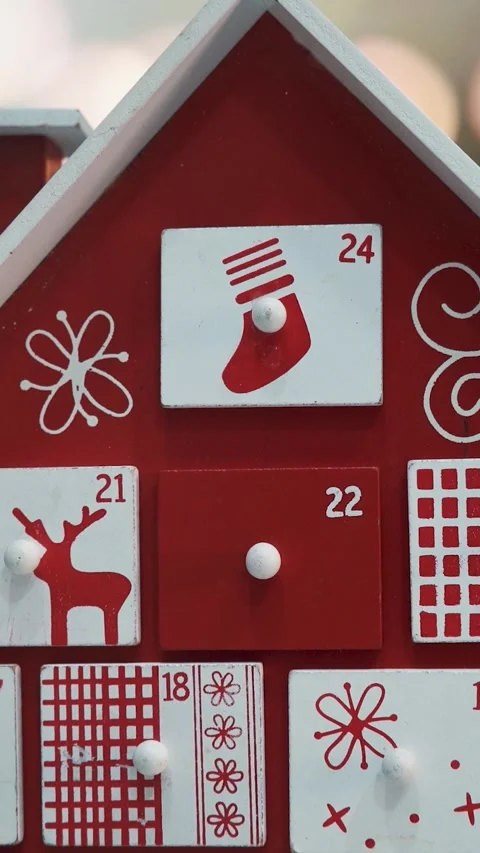Wooden Tree Advent Calendar in Front of a Real Christmas Tree Stock Footage 321711500