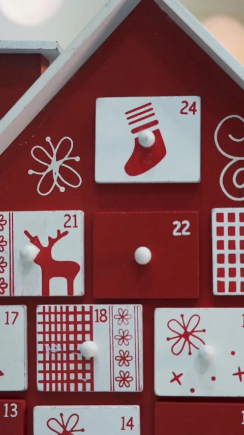 Wooden Tree Advent Calendar in Front of a Real Christmas Tree Stock Footage 321711507