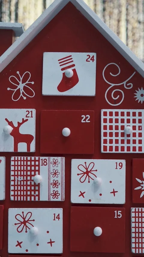 Wooden Tree Advent Calendar in Front of a Real Christmas Tree Stock Footage 321711524