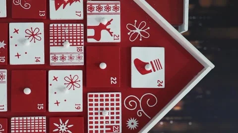 Wooden Tree Advent Calendar in Front of a Real Christmas Tree Decorated Stock Footage 321866765