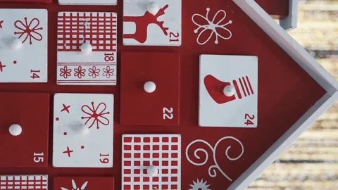 Wooden Tree Advent Calendar in Front of a Real Christmas Tree Decorated Stock Footage 321866777
