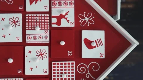 Wooden Tree Advent Calendar in Front of a Real Christmas Tree Decorated Stock Footage 321866818