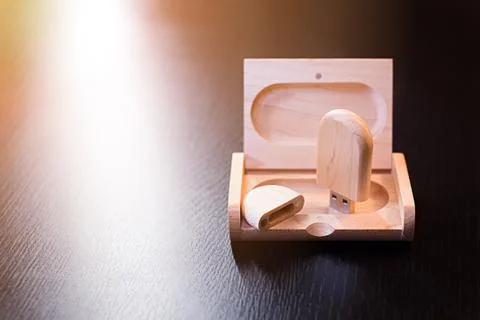 Wooden usb flash drive on a black table Stock Photos