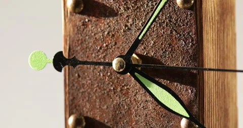 Wooden wall clock with rusty iron plate Stock Footage 169662973