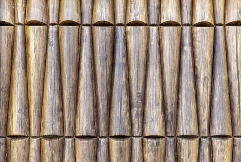 Wooden wall panel with 3D effect. Volumetric wooden texture. Stock Photos