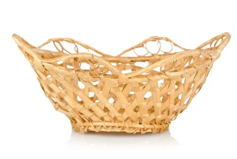 Wooden wattled basket isolated Stock Photos