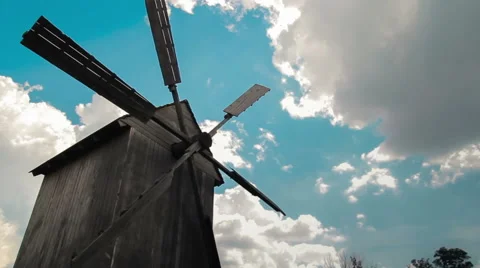 Wooden windmill with time lapse clouds in the sky. Stock Footage 44751245