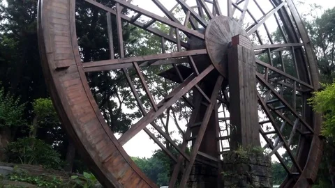 A wooden windmill, turning, as a landscape Stock Footage 80475007