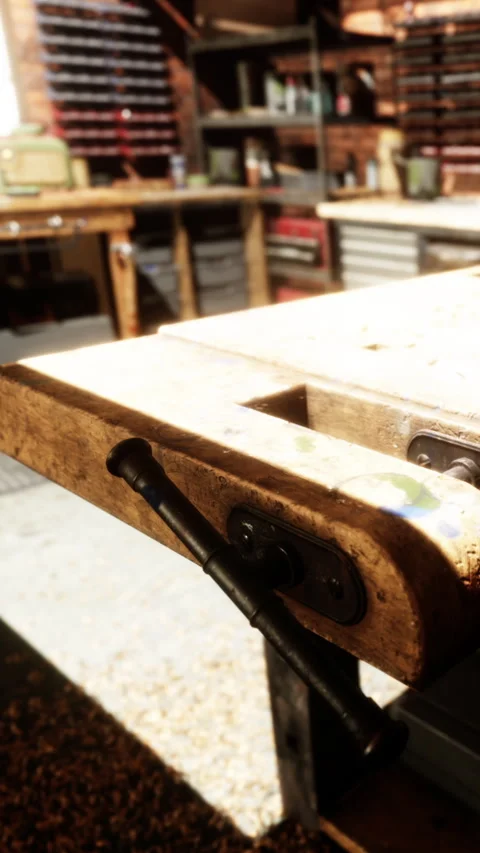Wooden workshop table close up in a busy carpentry space Stock Footage 338374582