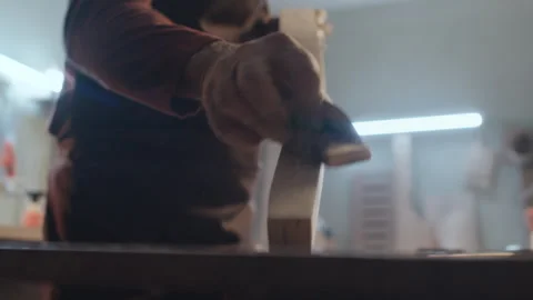 Woodmaker Using Special Technique While Smoothing Lumber Stem Stock Footage 253392111