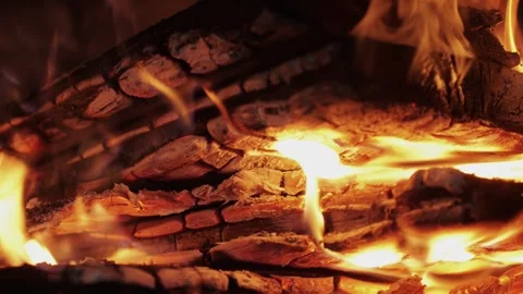 Woods are burning in the fireplace close-up. Cozy relaxing meditation. Bonefire Stock Footage 257084452
