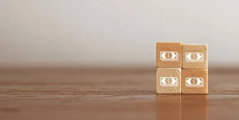 Woods block square with payment with dollar banknote (USD). Businessman sho.. Stock Photos