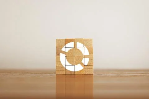Woods block square with pie chart. Growing and statistics graph. Success st.. Stock Photos
