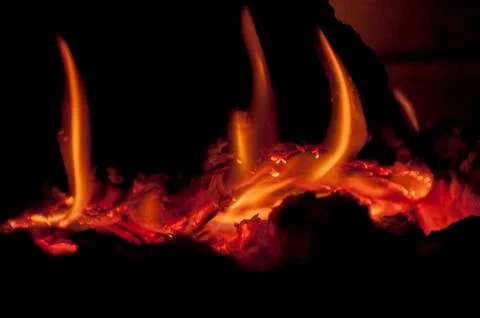 Woods in fireplace Stock Photos