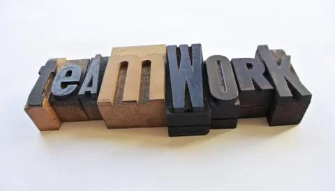 Woodtype letters teamwork Stock Photos