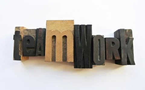 Woodtype letters teamwork Stock Photos