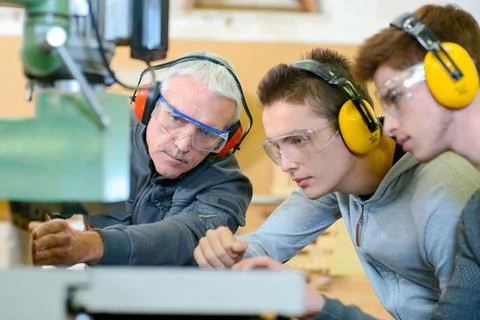 Woodwork apprenticeship Stock Photos