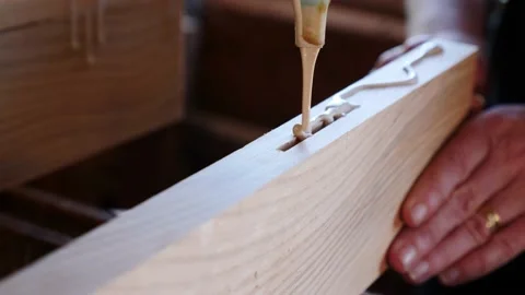 Woodwork biscuit joining glue up timber close up Stock Footage 231789396