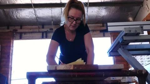 Woodwork calculating designing timber low view backlit Vidéo 231787546