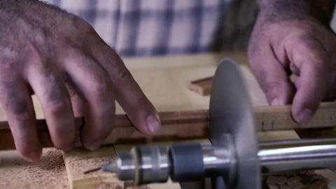 Woodwork - carpenter working with plane and wood plank at workshop Stock Footage 81485583