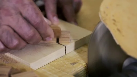 Woodwork - carpenter working with plane and wood plank at workshop Stock Footage 81485712