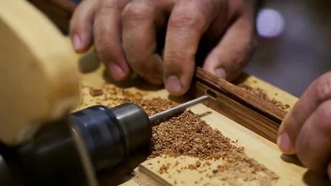 Woodwork - carpenter working with plane and wood plank at workshop Stock Footage 81485772
